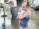jessica_ross_wades_through_flood_water_in_illinois.jpg